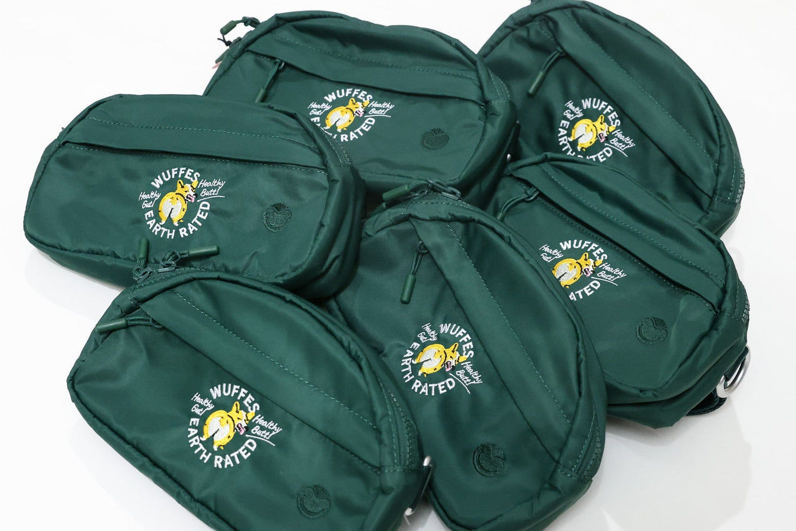 embroidered green fanny packs with dog logo