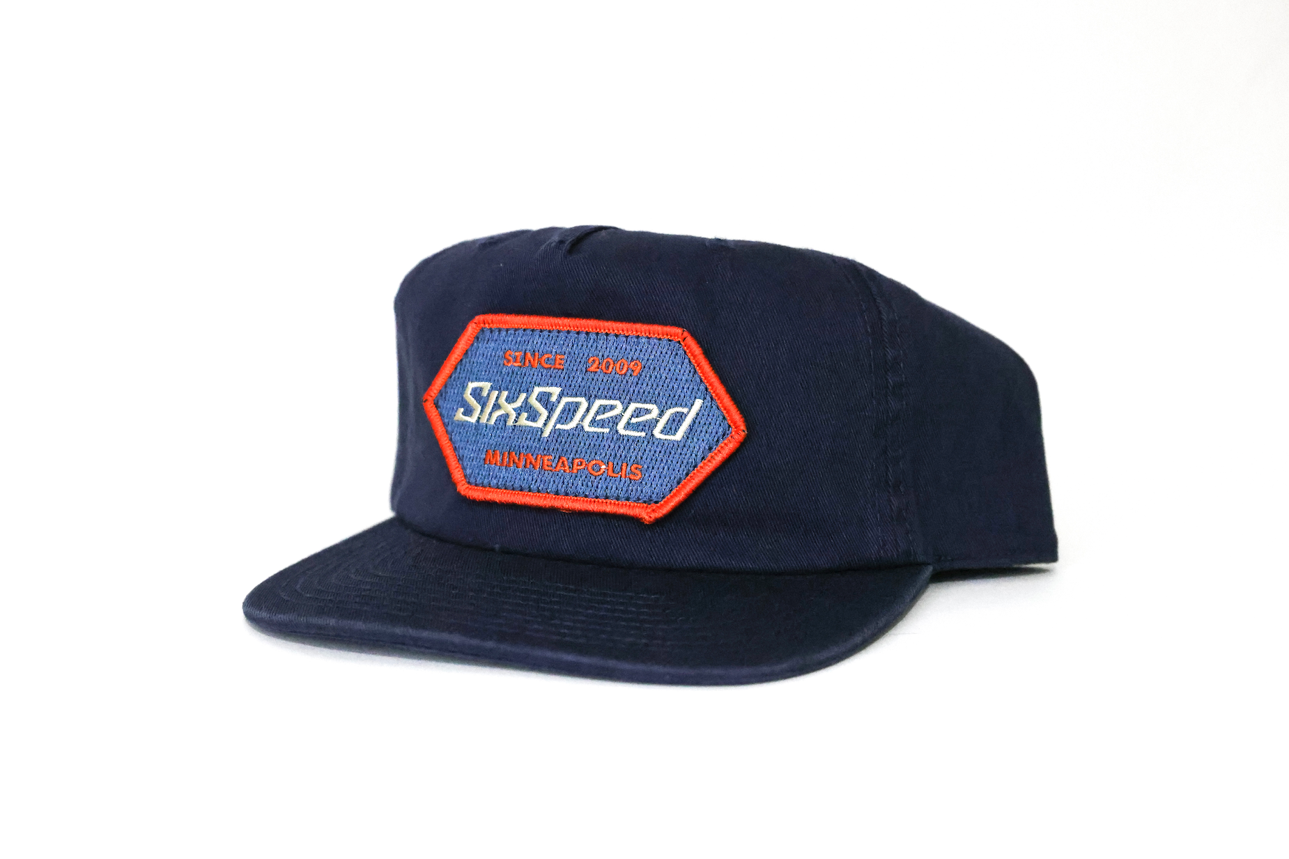 Navy blue hat with embroidered patch